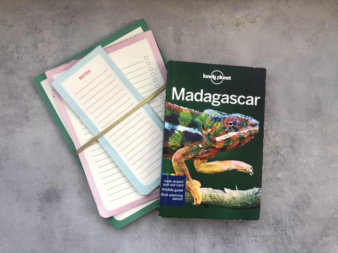 Lonely Planet Travel Guide book on Madagascar and notebooks