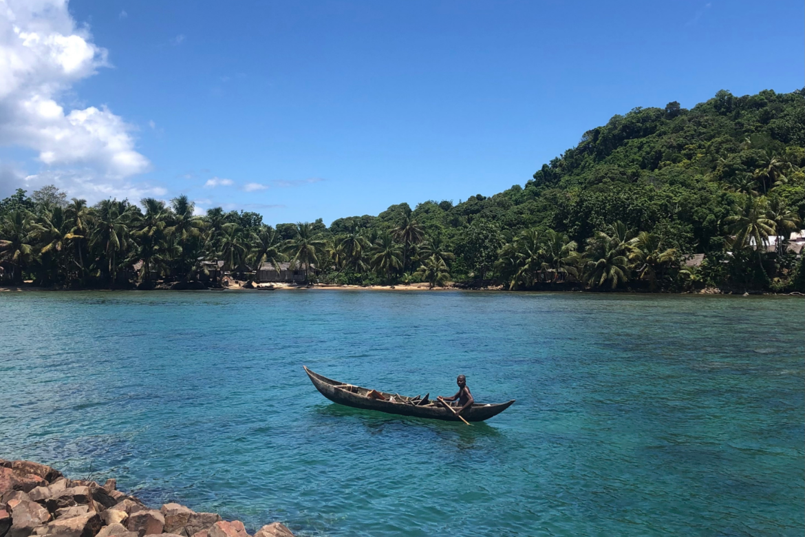 Malagasy in Pirougue coming come from a fishing trip